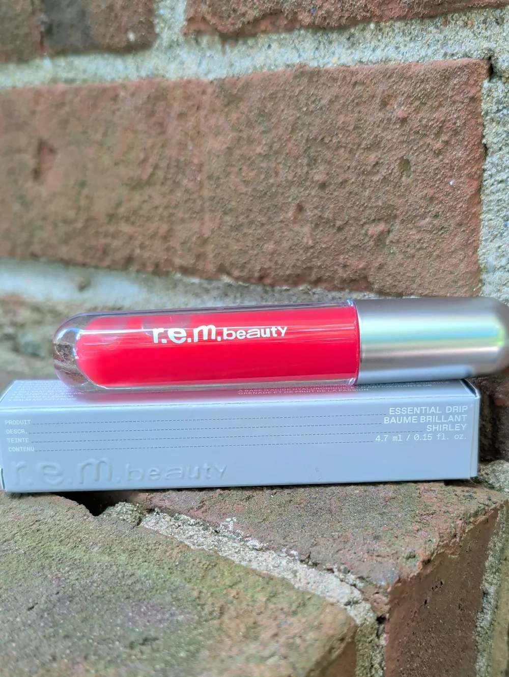REM Beauty Essential Drip Glossy Balm  in Shirley (Pink-Red)